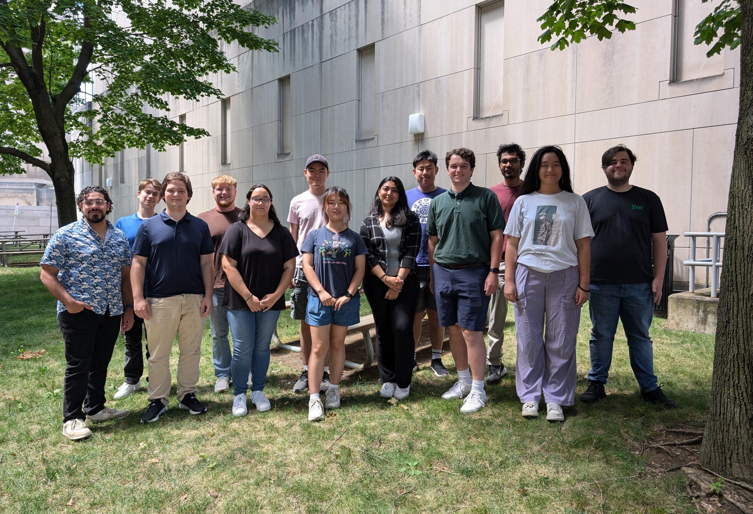 A group photo of 13 PSC interns. 